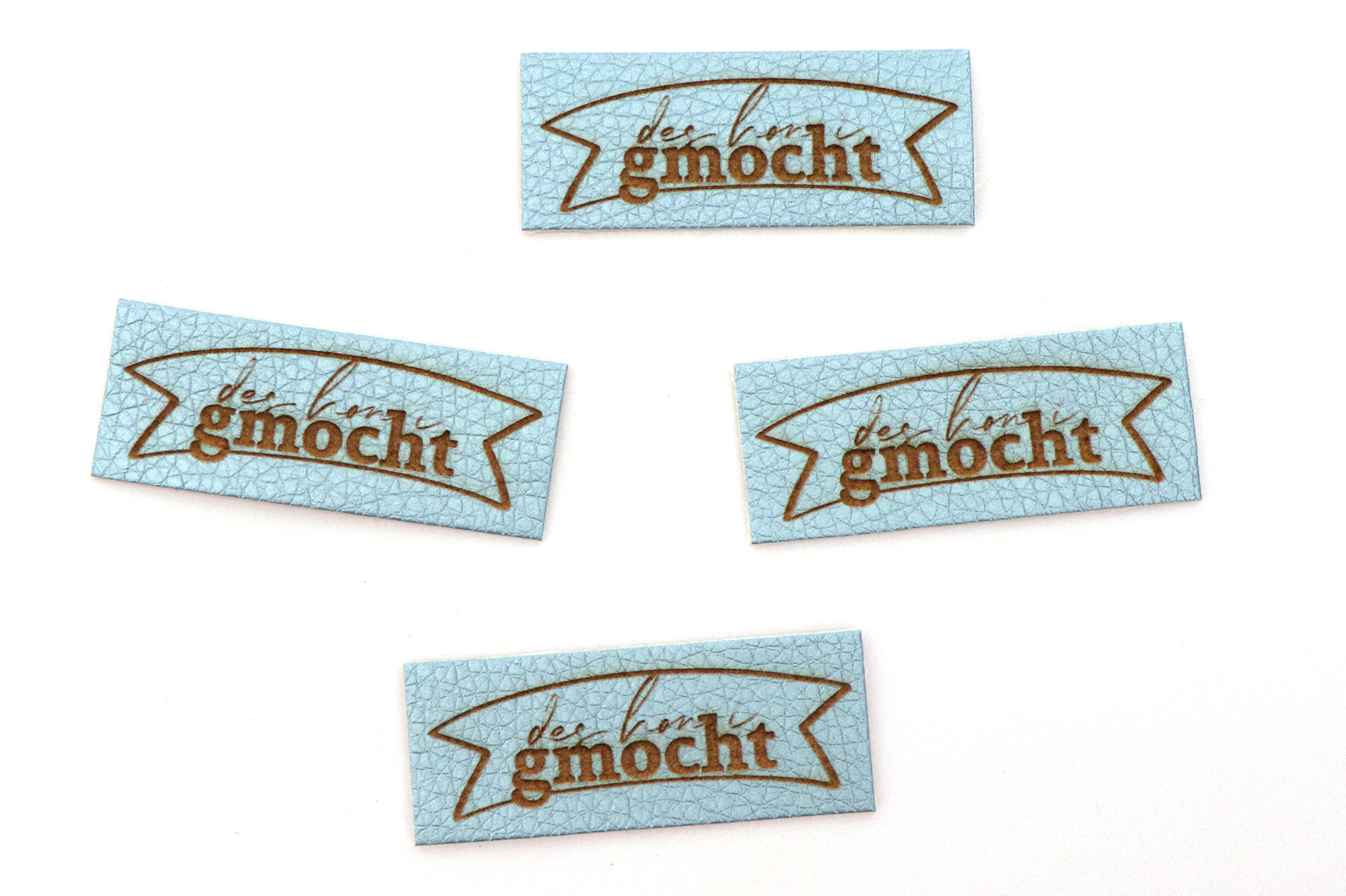 Label, "des hon i gmocht" hellblau