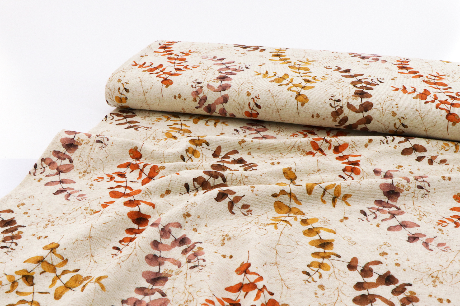 Leinenjersey, Eukalyptusmuster in Senf / Rottönen